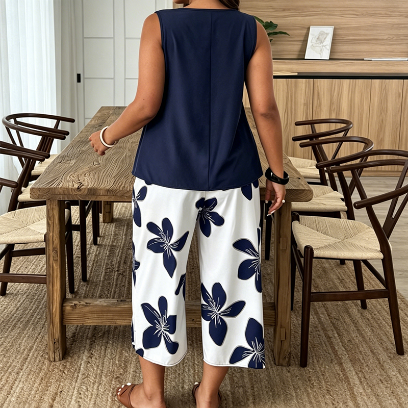 🌸 NUR FÜR KURZE ZEIT: 50 % RABATT! ✨ Set aus asymmetrischem Damenoberteil und Caprihose mit Blumenmuster – vielseitig, farbenfroh, bequem 🌺