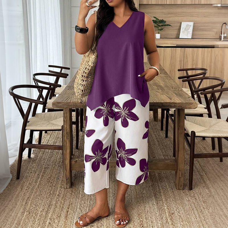 🌸 NUR FÜR KURZE ZEIT: 50 % RABATT! ✨ Set aus asymmetrischem Damenoberteil und Caprihose mit Blumenmuster – vielseitig, farbenfroh, bequem 🌺