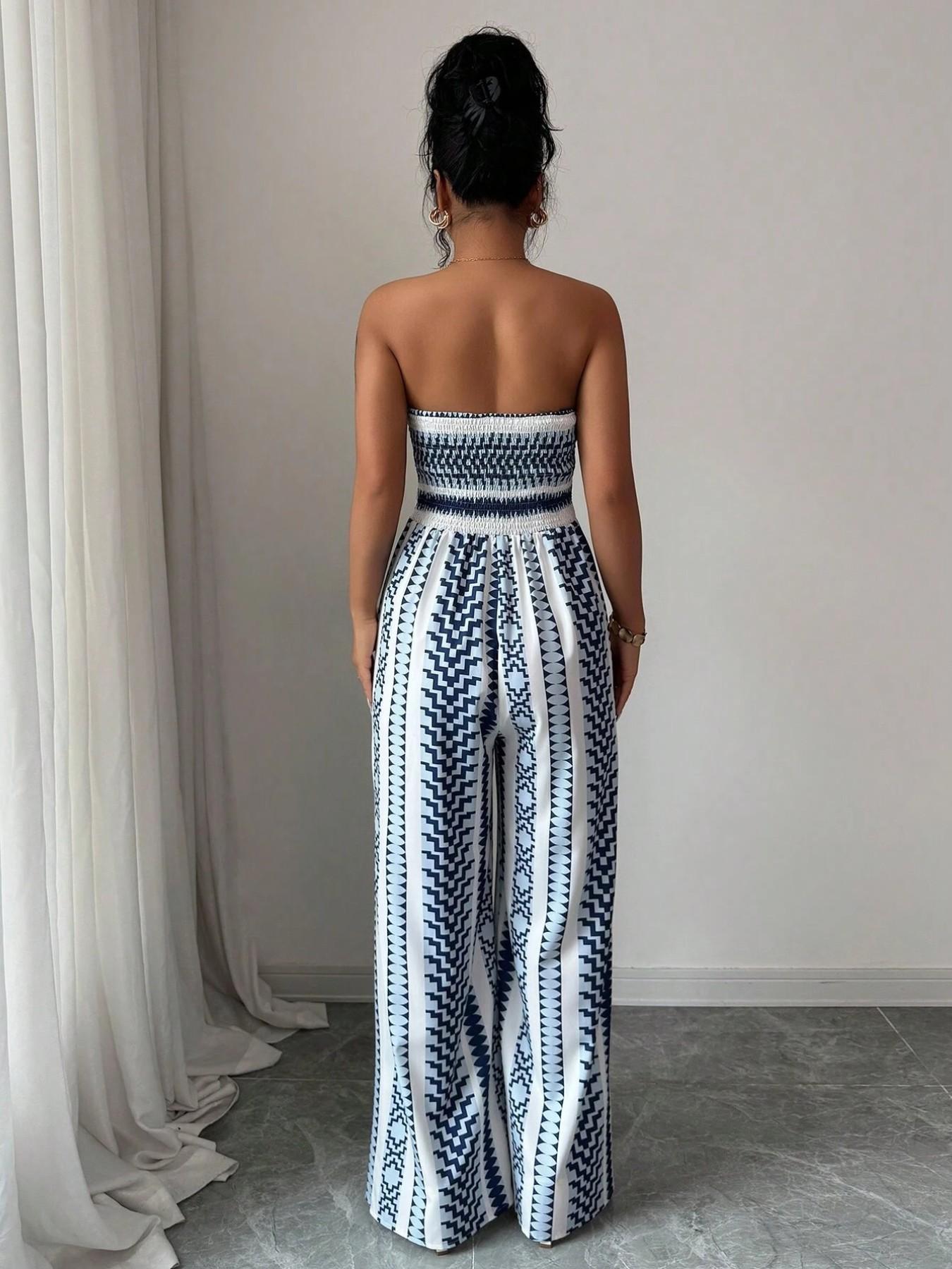 👗💙 Geometrischer Jumpsuit mit Halter-Ausschnitt & Seitenschlitz!
